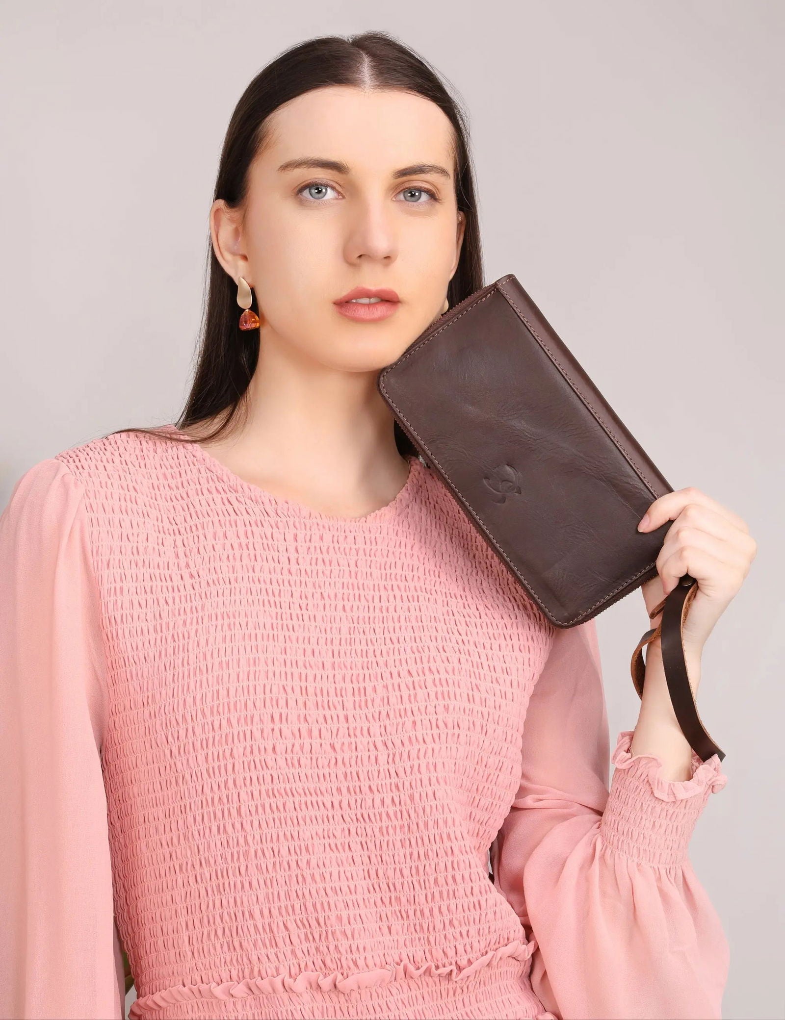 CONCERTINA LEATHER CLUTCH - Stitch And Carry